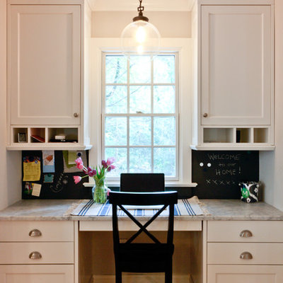Elegant built-in desk home office photo in Newark