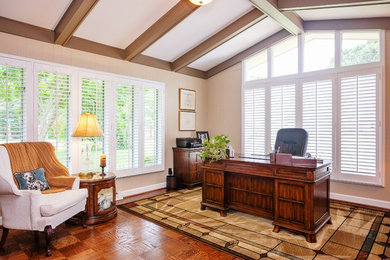 Large transitional home office photo in Other