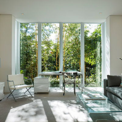 Home office - mid-sized contemporary freestanding desk carpeted home office idea in Miami with white walls and no fireplace