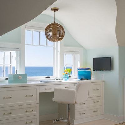 Inspiration for a coastal built-in desk light wood floor study room remodel in Bridgeport with green walls