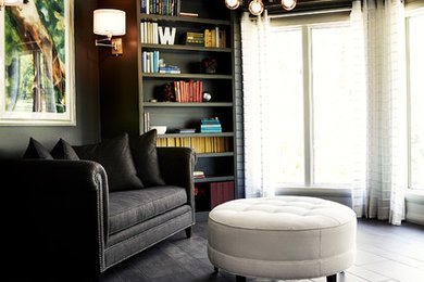 Inspiration for a mid-sized contemporary gray floor home office library remodel in Other with black walls
