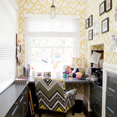 Trendy built-in desk home office photo in Other