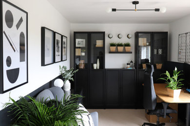 Inspiration for a small contemporary study in Other with black walls.