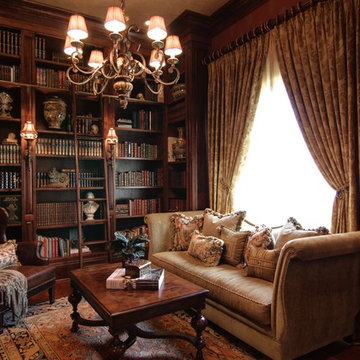 Cozy Elegant Library with Custom Bookcases