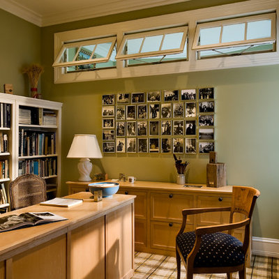 Home office - traditional freestanding desk carpeted home office idea in New York with green walls