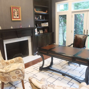 Example of a trendy home office design in New York