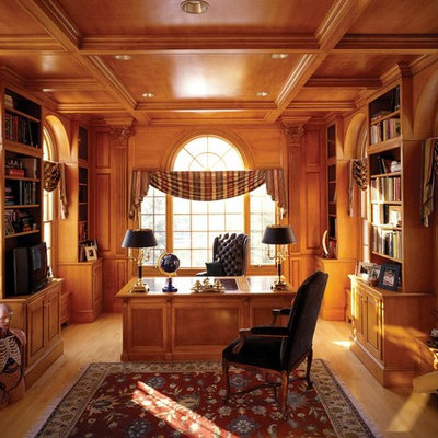 Inspiration for a timeless freestanding desk medium tone wood floor home office remodel in Boston