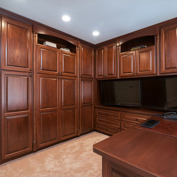 Custom Office with Cherry Raised Panel Doors and Wood Countertops