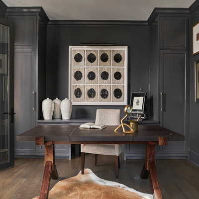 Study room - mid-sized transitional freestanding desk dark wood floor and brown floor study room idea in Chicago with black walls and no fireplace
