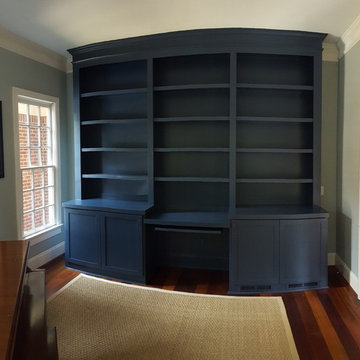 Dark Blue Office Built-in With Center Desk and Pullouts