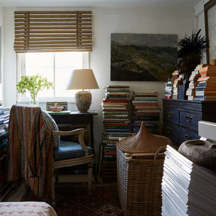 Design ideas for a bohemian home office in London with white walls and a freestanding desk.