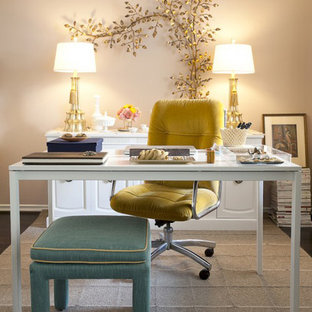 Design ideas for a traditional home office in Orange County with beige walls and a freestanding desk.