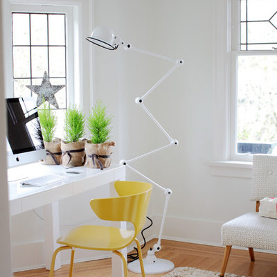 Inspiration for an eclectic freestanding desk home office remodel in Vancouver