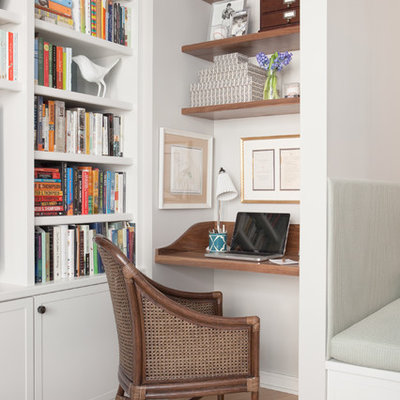 Inspiration for a small transitional built-in desk light wood floor and beige floor study room remodel in Boston with gray walls and no fireplace
