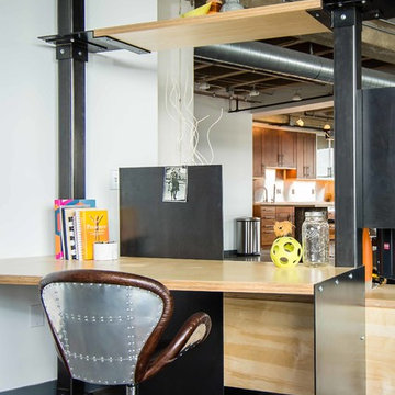 Downtown Loft Transformation Unites Industrial and Organic Elements