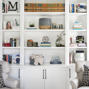 Inspiration for a large coastal medium tone wood floor and brown floor home office library remodel in Chicago with gray walls