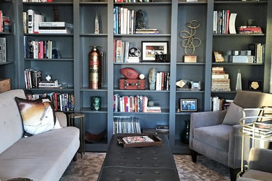 Example of a mid-sized eclectic dark wood floor home office design in Nashville with gray walls and no fireplace