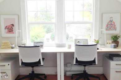 Home studio - small eclectic freestanding desk medium tone wood floor home studio idea in Portland with white walls