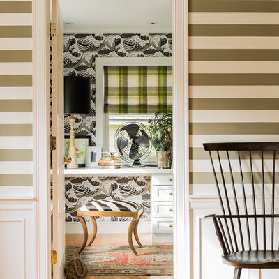 Inspiration for an eclectic built-in desk medium tone wood floor home office remodel in Boston