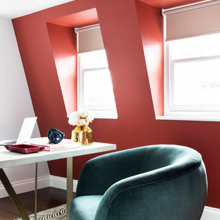 Inspiration for a contemporary study in London with red walls, dark hardwood flooring and a freestanding desk.