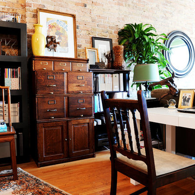 Eclectic freestanding desk medium tone wood floor home office photo in Chicago