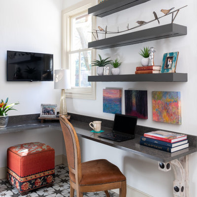 Example of a small eclectic built-in desk ceramic tile and multicolored floor study room design in Dallas with white walls