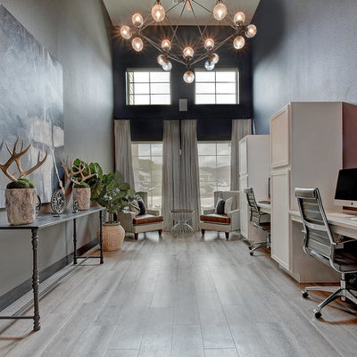 Mid-sized transitional built-in desk study room photo in San Diego with beige walls