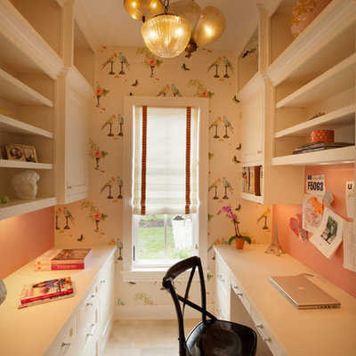 Example of a classic built-in desk beige floor home office design in Minneapolis