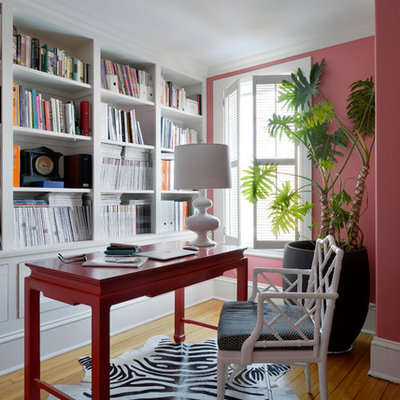 Inspiration for a large timeless freestanding desk light wood floor home office library remodel in Ottawa with pink walls and no fireplace