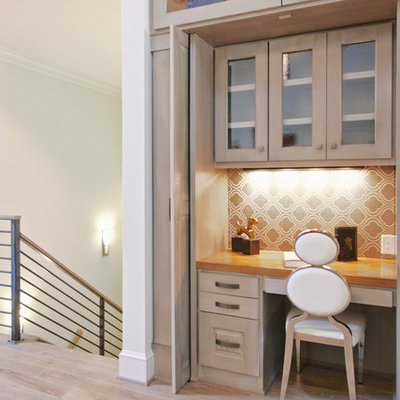 Small trendy built-in desk light wood floor and beige floor study room photo in Raleigh with beige walls and no fireplace