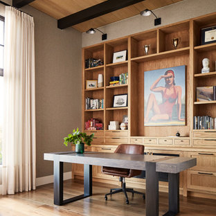 Home office - farmhouse freestanding desk medium tone wood floor home office idea in San Francisco with gray walls