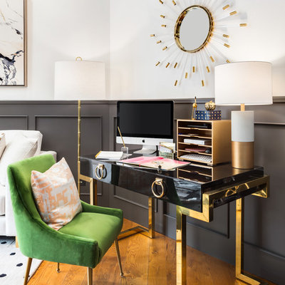 Small transitional freestanding desk medium tone wood floor study room photo in Portland with multicolored walls