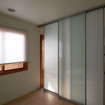 flexible office space with frosted glass sliding wall