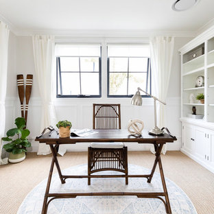 Photo of a country study room in Brisbane with white walls, carpet, a freestanding desk and beige floor.