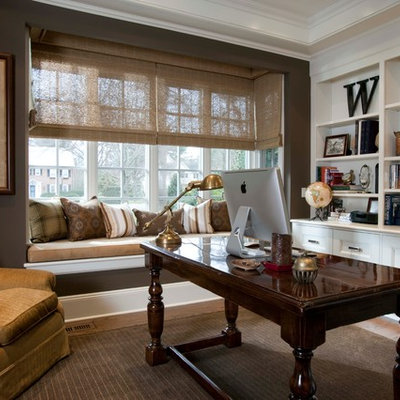 Inspiration for a timeless freestanding desk dark wood floor and brown floor home office remodel in New York with brown walls