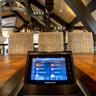 Inspiration for a large rustic freestanding desk medium tone wood floor study room remodel in Denver