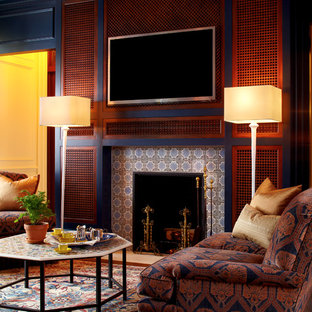 Example of a classic home office design in New York with a standard fireplace and a tile fireplace