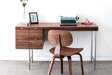 Design ideas for a medium sized modern home office in Other with a freestanding desk.