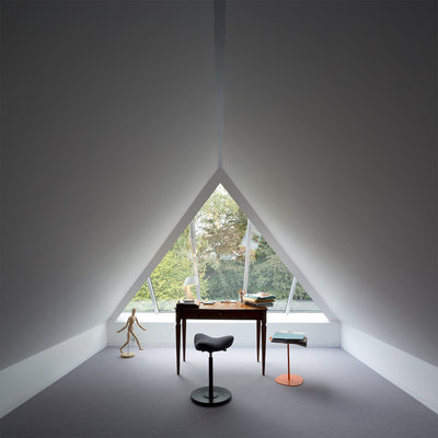 Small trendy freestanding desk carpeted study room photo in London with white walls and no fireplace