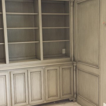 Hand- glazed library woodwork in soft gray/green