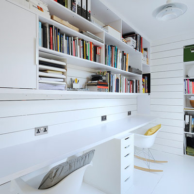 Home office - scandinavian built-in desk white floor home office idea in Other with white walls
