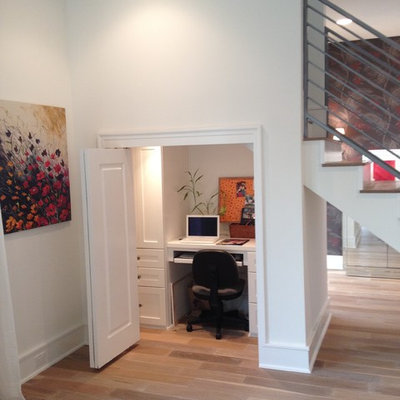 Home office - contemporary beige floor home office idea in Austin with white walls