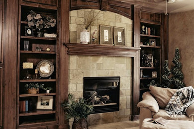 Example of a transitional home office design in Denver