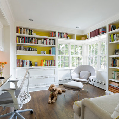 Inspiration for a timeless built-in desk home office remodel in Minneapolis with yellow walls