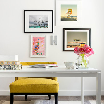 Study room - mid-sized transitional freestanding desk dark wood floor study room idea in Los Angeles with white walls