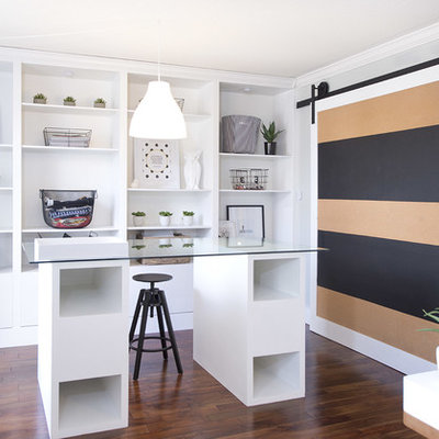 Home office - contemporary freestanding desk dark wood floor home office idea in Toronto with gray walls