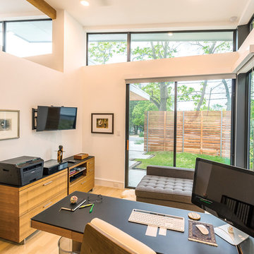 Home office has excellent views to the outside thanks to the sliding glass door