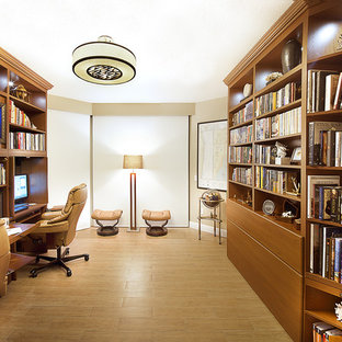 Study room - small contemporary built-in desk ceramic tile study room idea in Miami