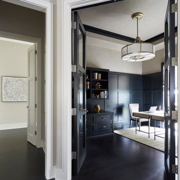 Home Office/Library with Black Wainscoting and Black Cabinetry