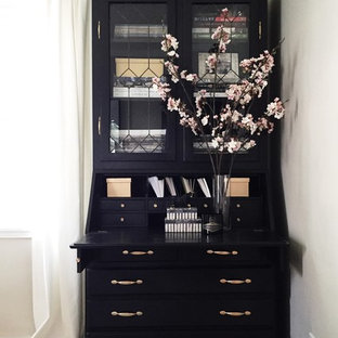 Example of a small transitional freestanding desk light wood floor home office design in Denver with gray walls and no fireplace